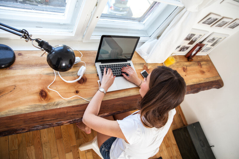 Middle age woman working on her blog