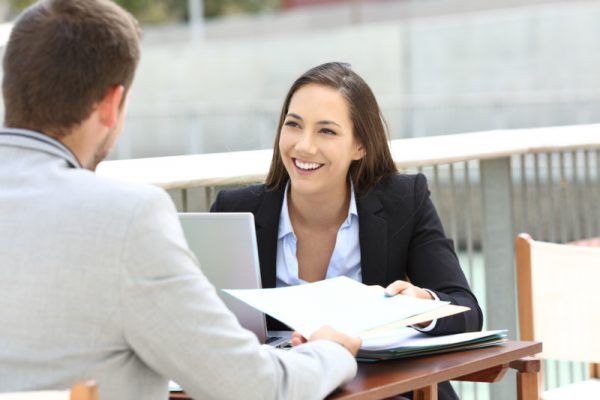 Two executives working sharing informs