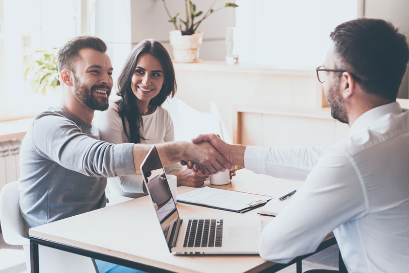 Accountant Shaking Hands With Client