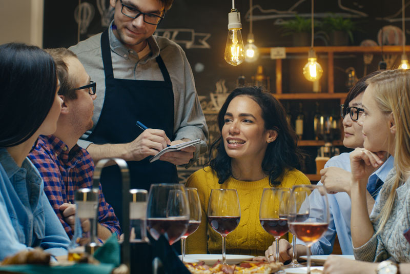 Friends Eating at a Restaurant