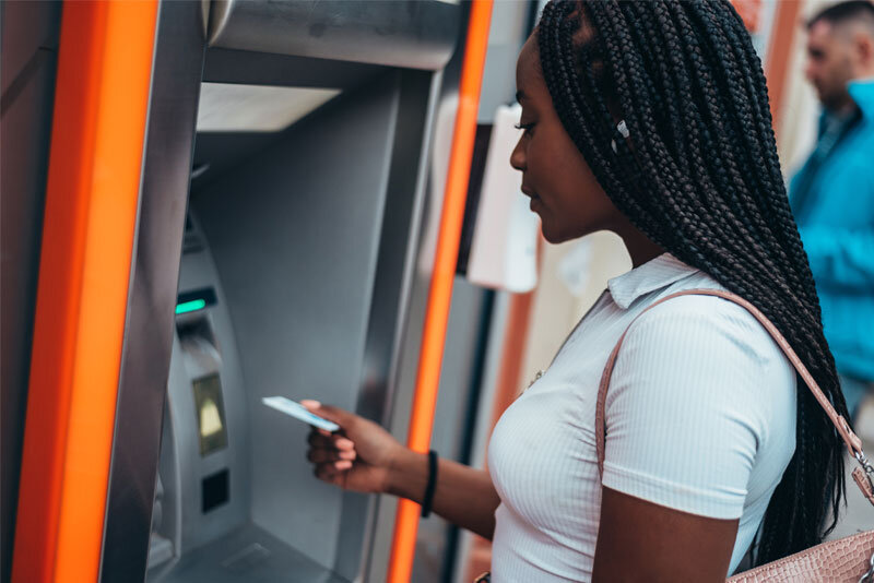 Woman Using ATM