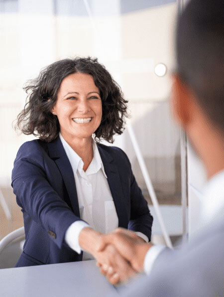 Smiling Woman in Suit