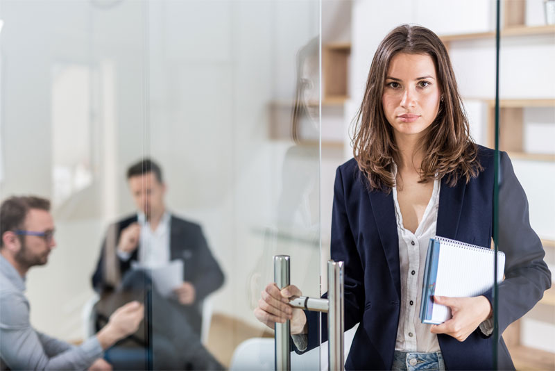Woman Exiting Business Meeting