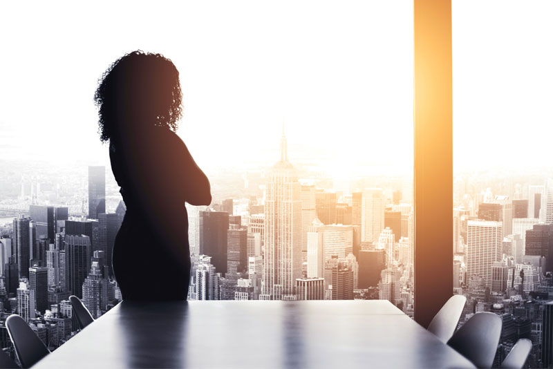 Woman Alone in Large Office