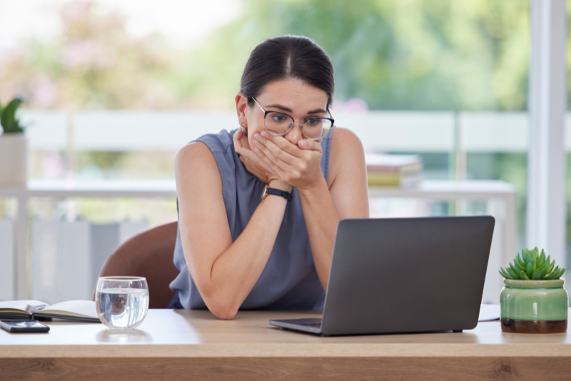 Woman in Looking at Laptop in Shock v2 Woman in Looking at Laptop in Shock